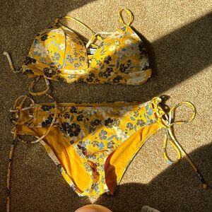 Brand new top is size small, bottom is a medium